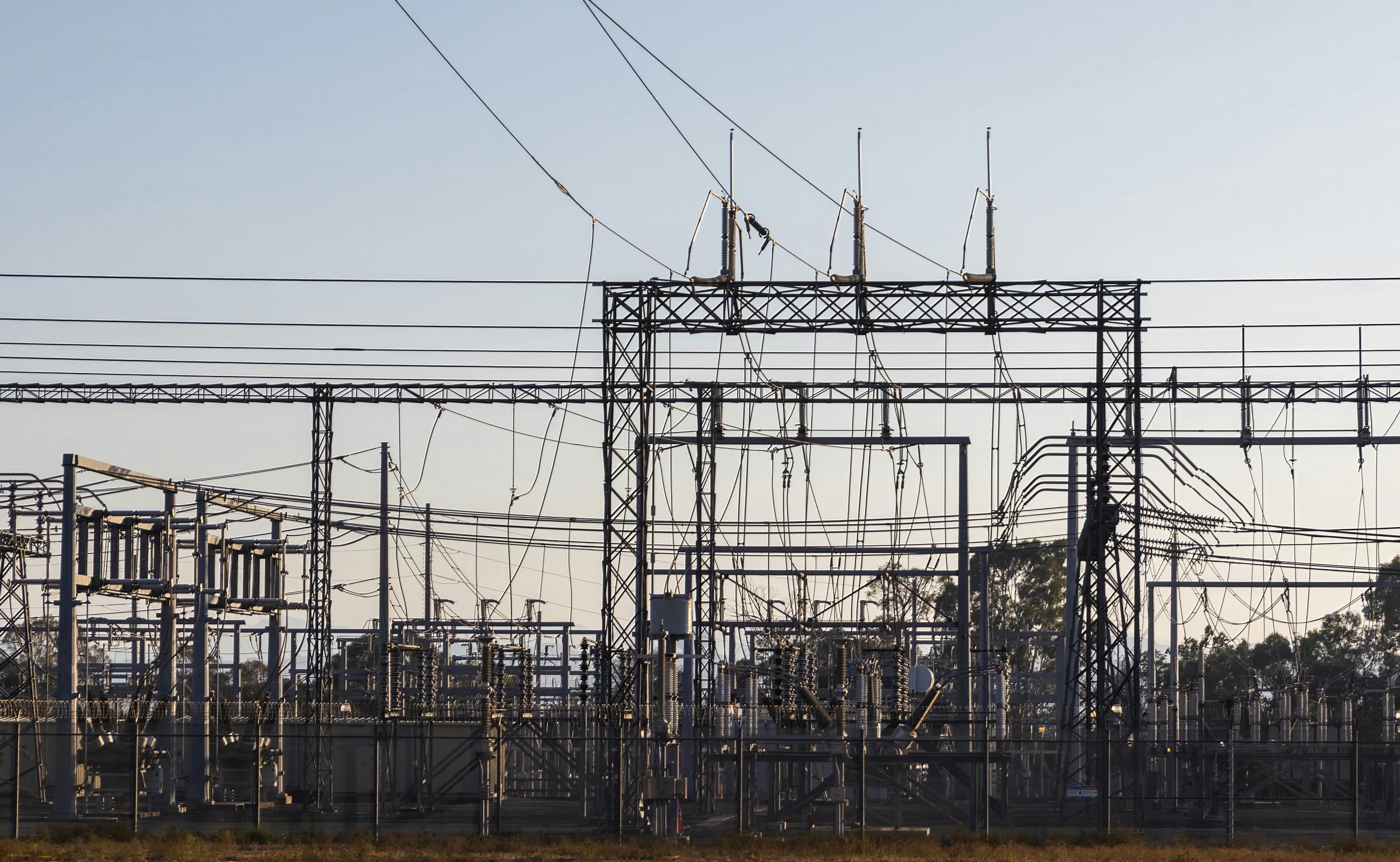 Electrical substation with steel structures and overhead power lines