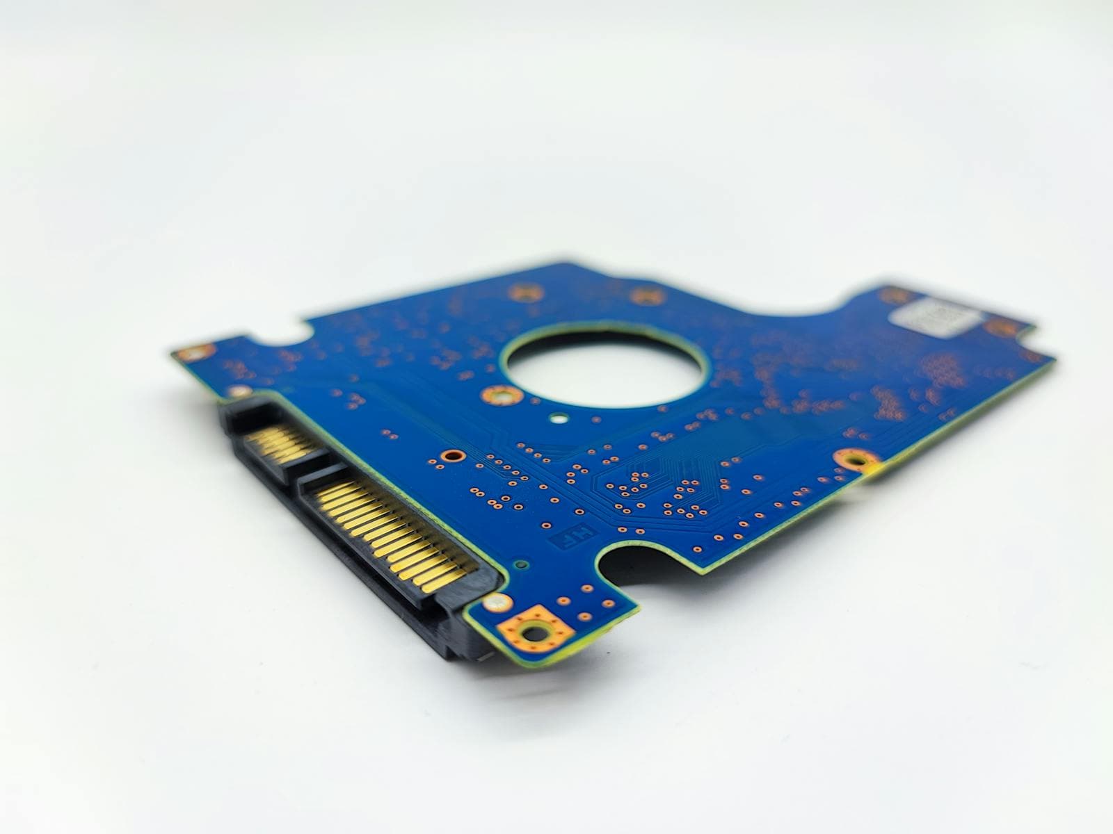 Close-up of a hard drive circuit board and storage electronics