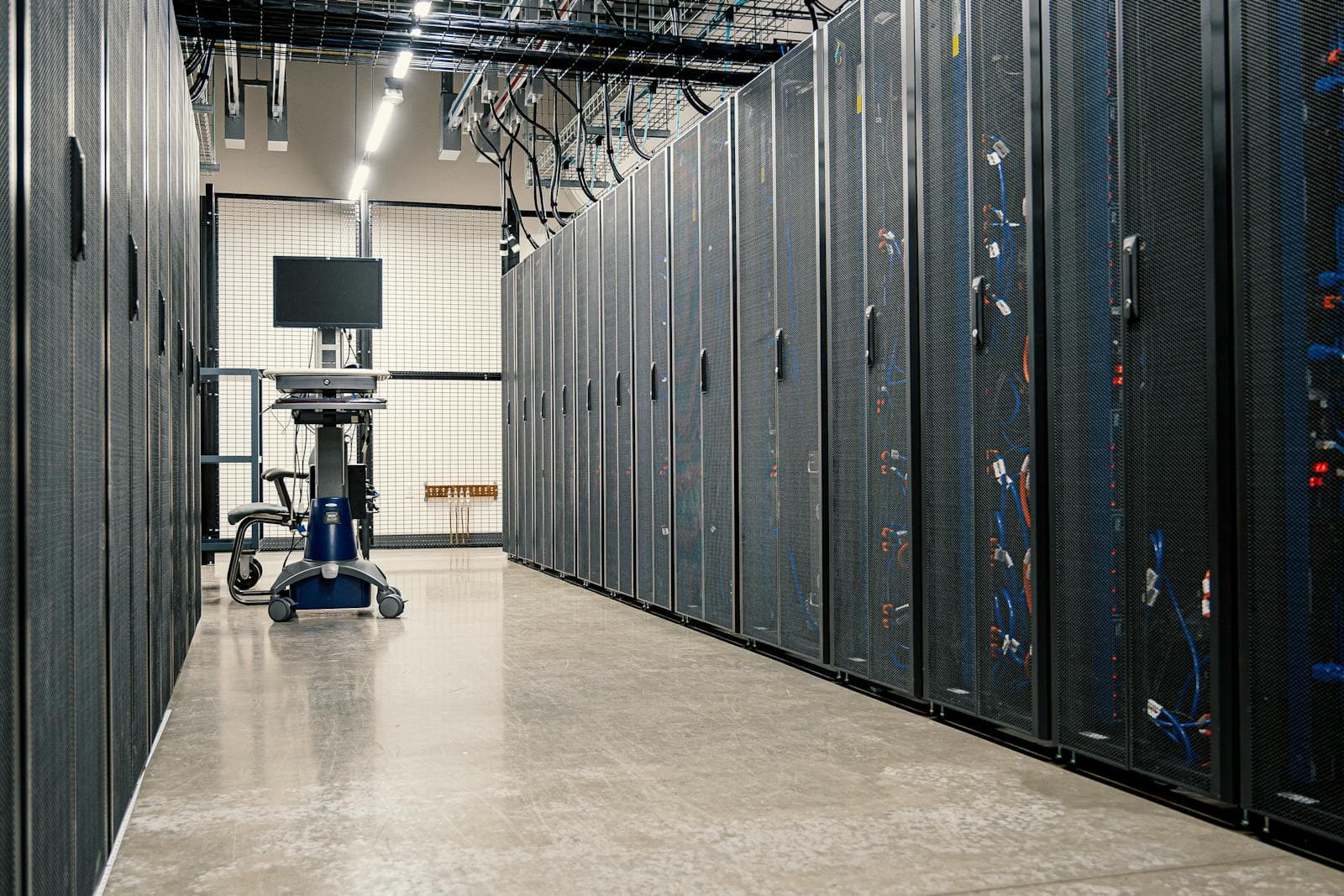 Steel server cabinets and network cabling inside a data center