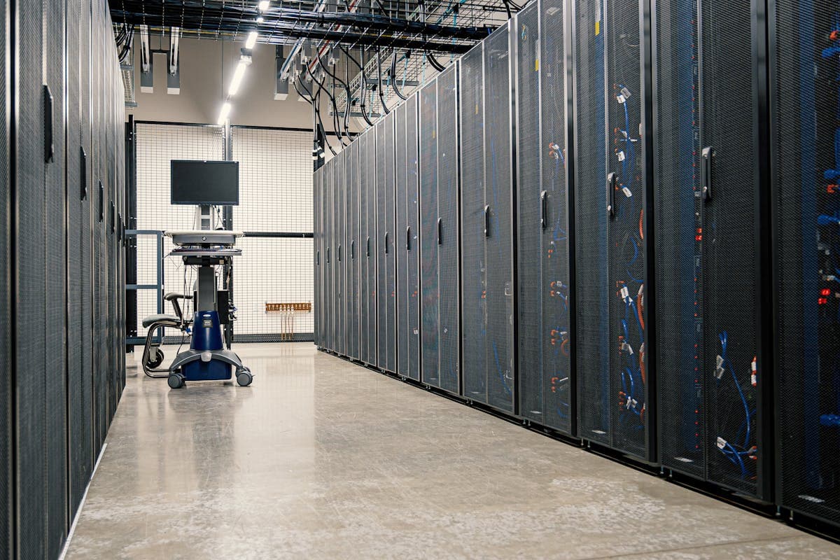 Row of server racks in a modern data center